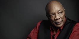 Quincy Jones nasceu em Chicago no dia 14 março de 1933. Foi criado em Seattle, teve infância pobre e despertou para música através da sua participação num quarteto vocal da igreja que frequentava. Ele fazia parte de um quarteto vocal, mas foi o trompete que despertou sua atenção a partir dos dez anos, recebendo aulas de Clark Terry. Mais tarde ganhou uma bolsa de estudos para frequentar a Universidade de Berklee em Boston. 